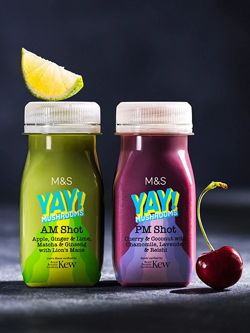 Two small bottles of colourful juice.
