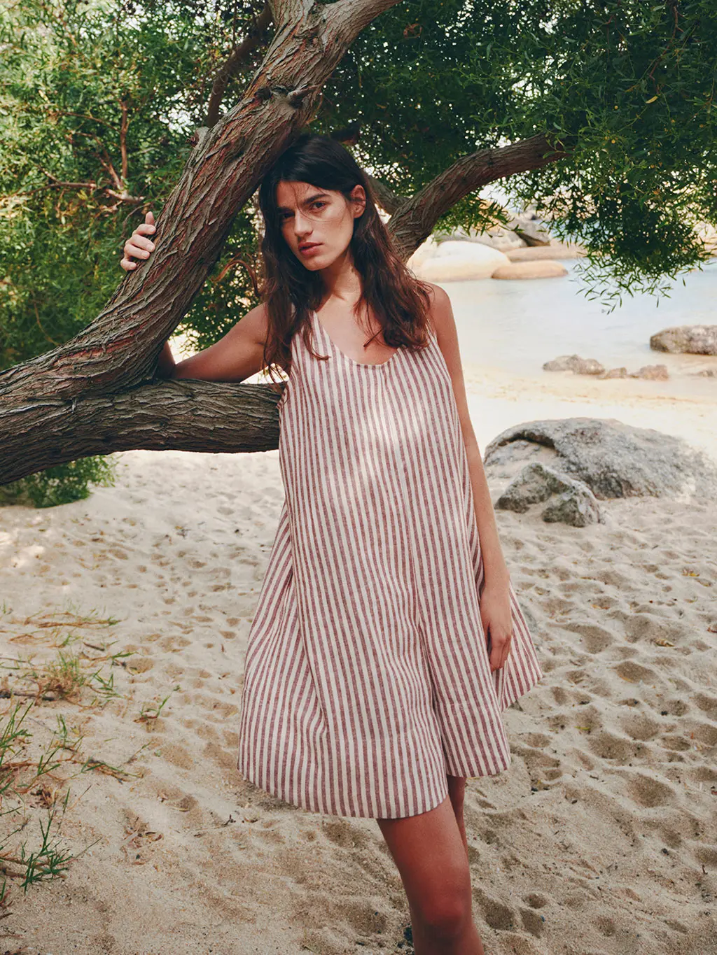 Woman in striped playsuit