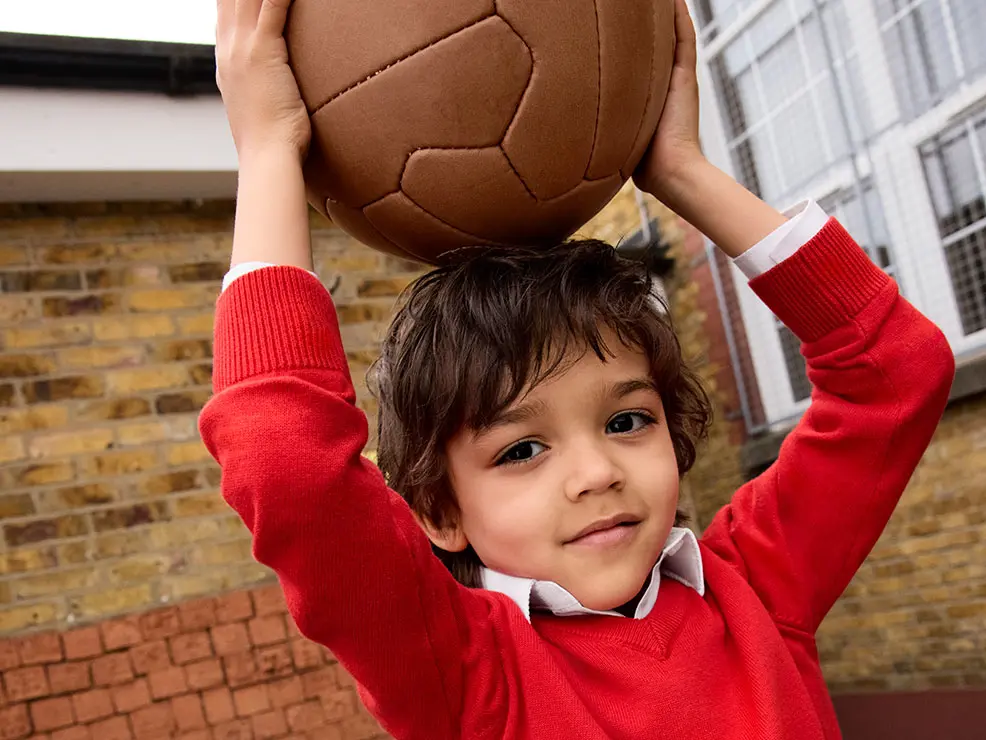Boy wearing M&S school uniform