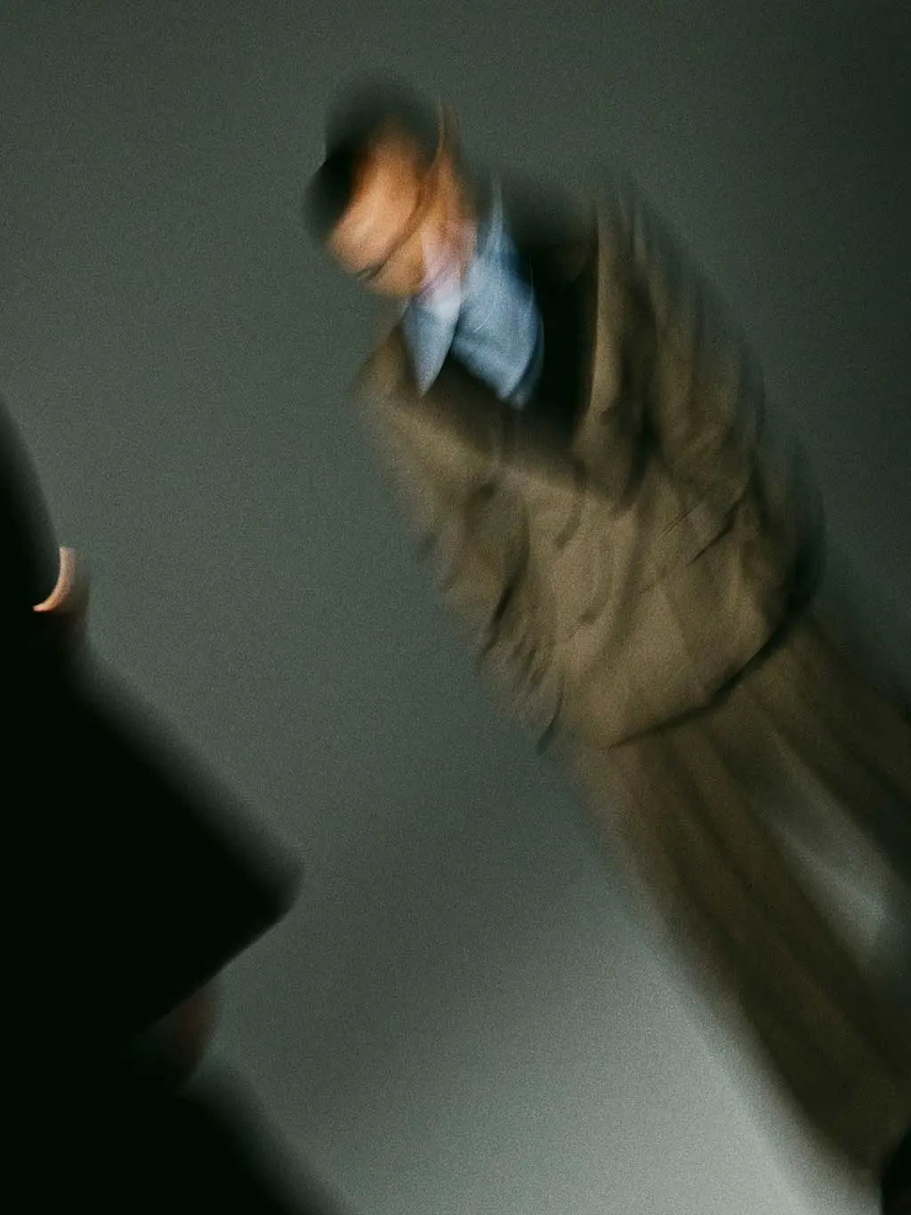 Blurred image of woman in suit