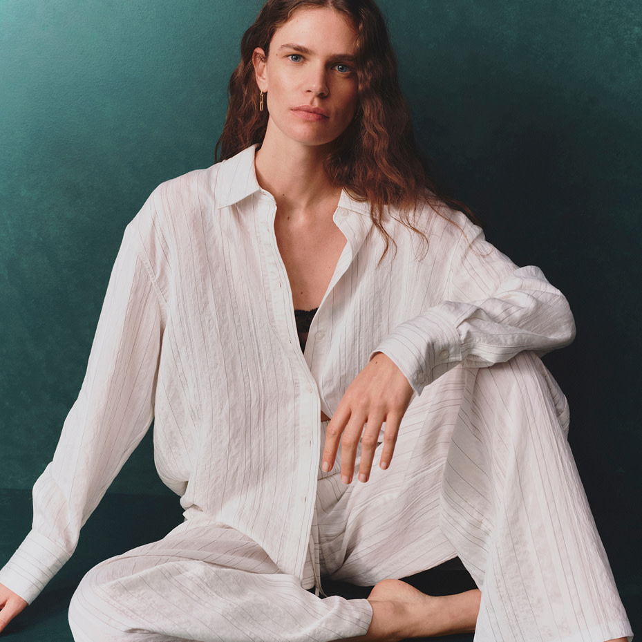 Woman wearing white pyjama set