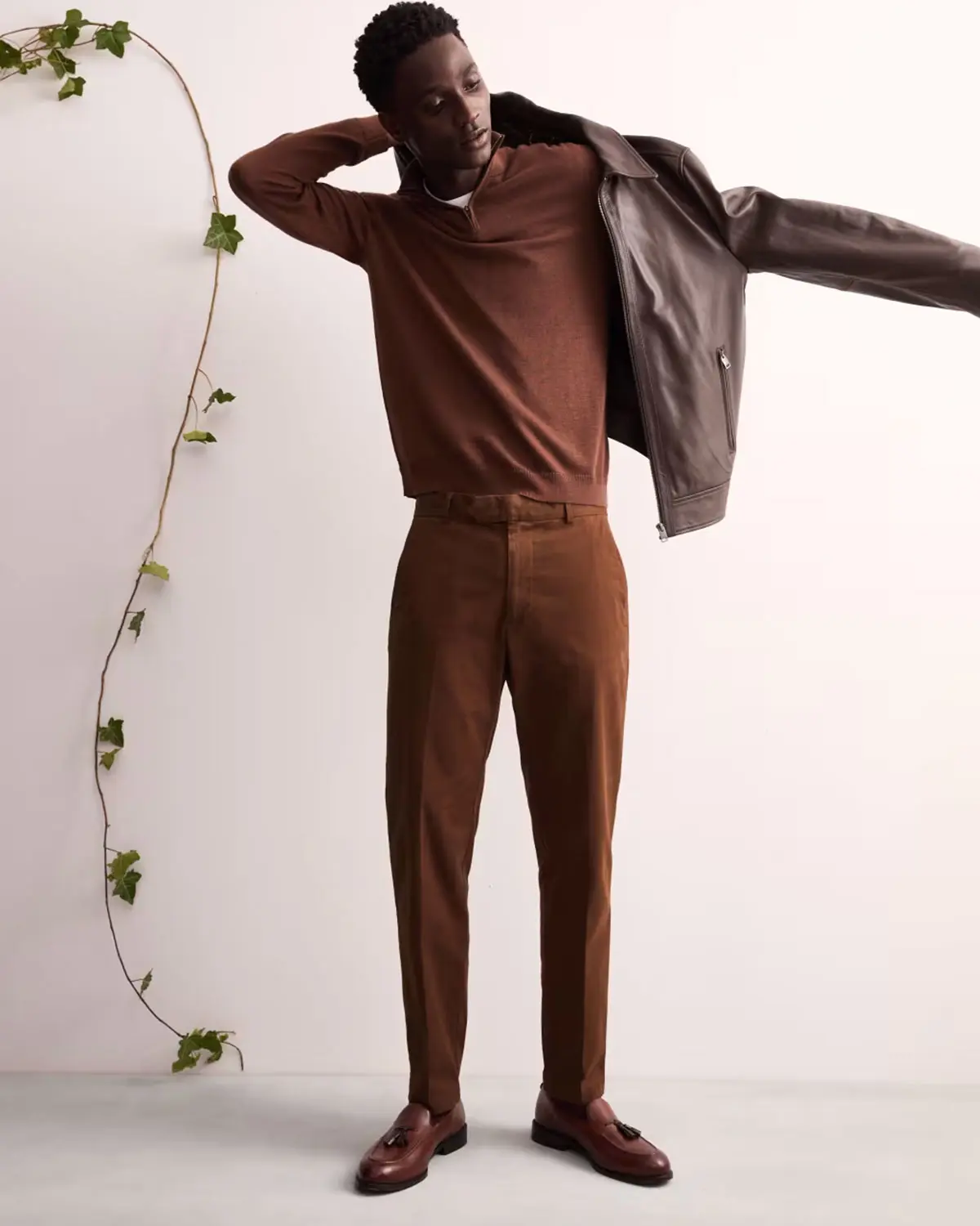 Man wearing tapered chinos by Jaeger at M&S