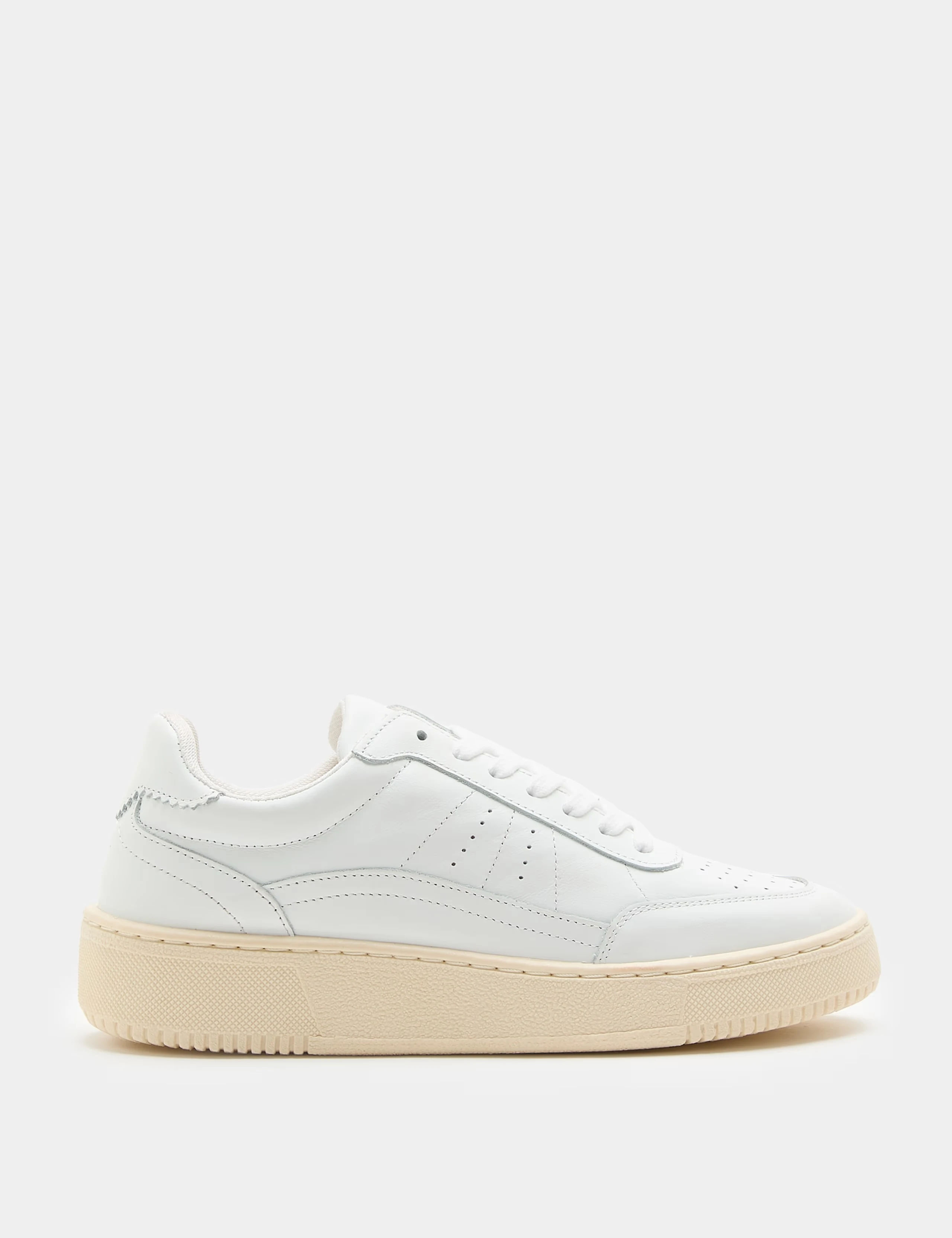 White trainers with a beige sole and chunky design.