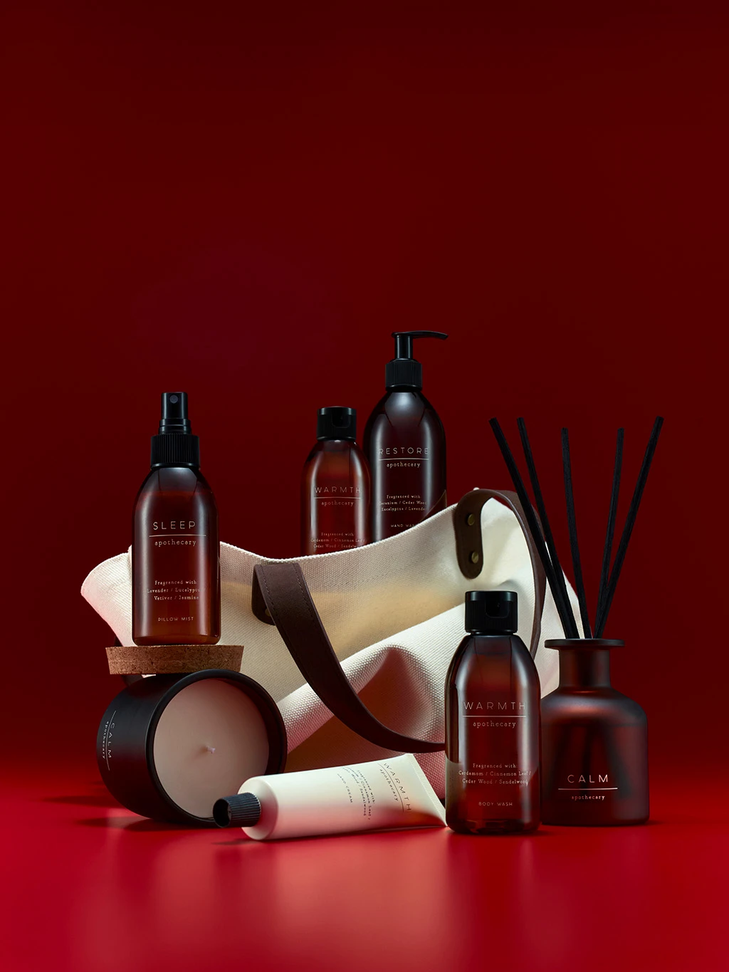 Group of M&S Apothecary wellness products, including candles, diffusers and creams.