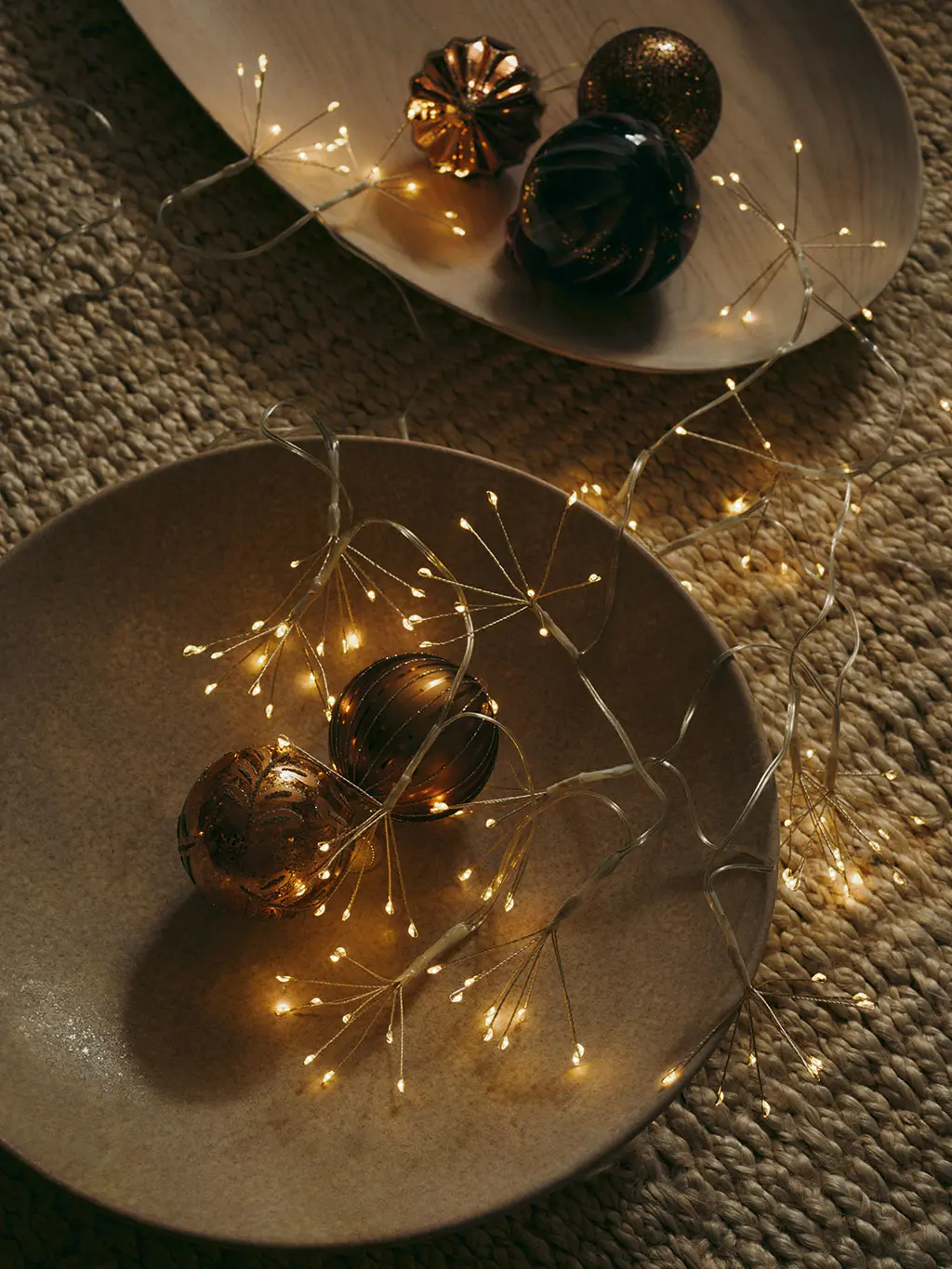 String lights in bowl on table