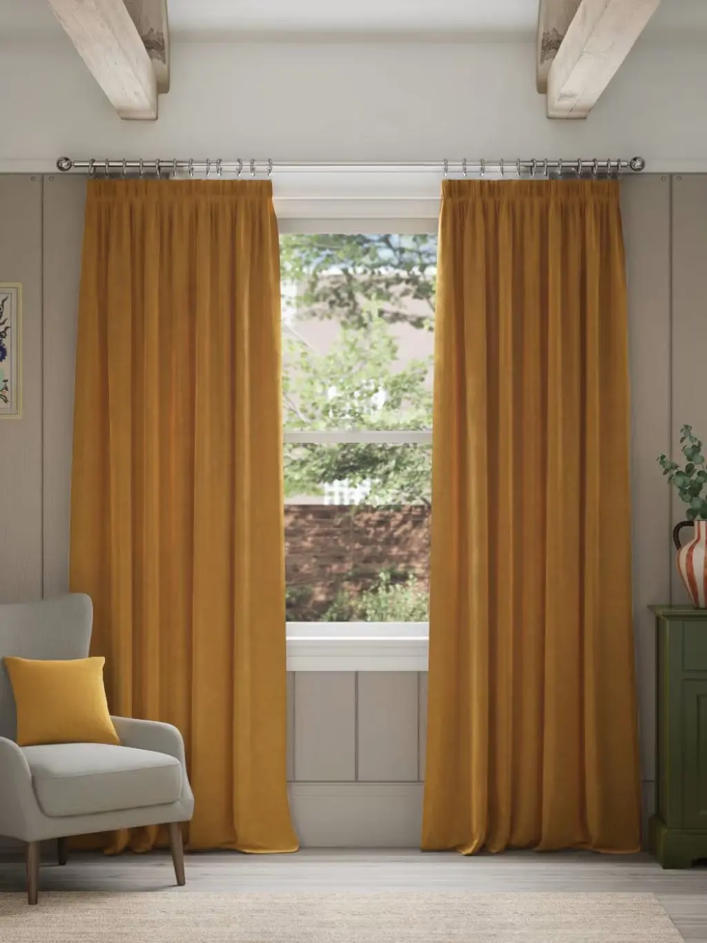 A room with grey panelling and ochre velvet curtains