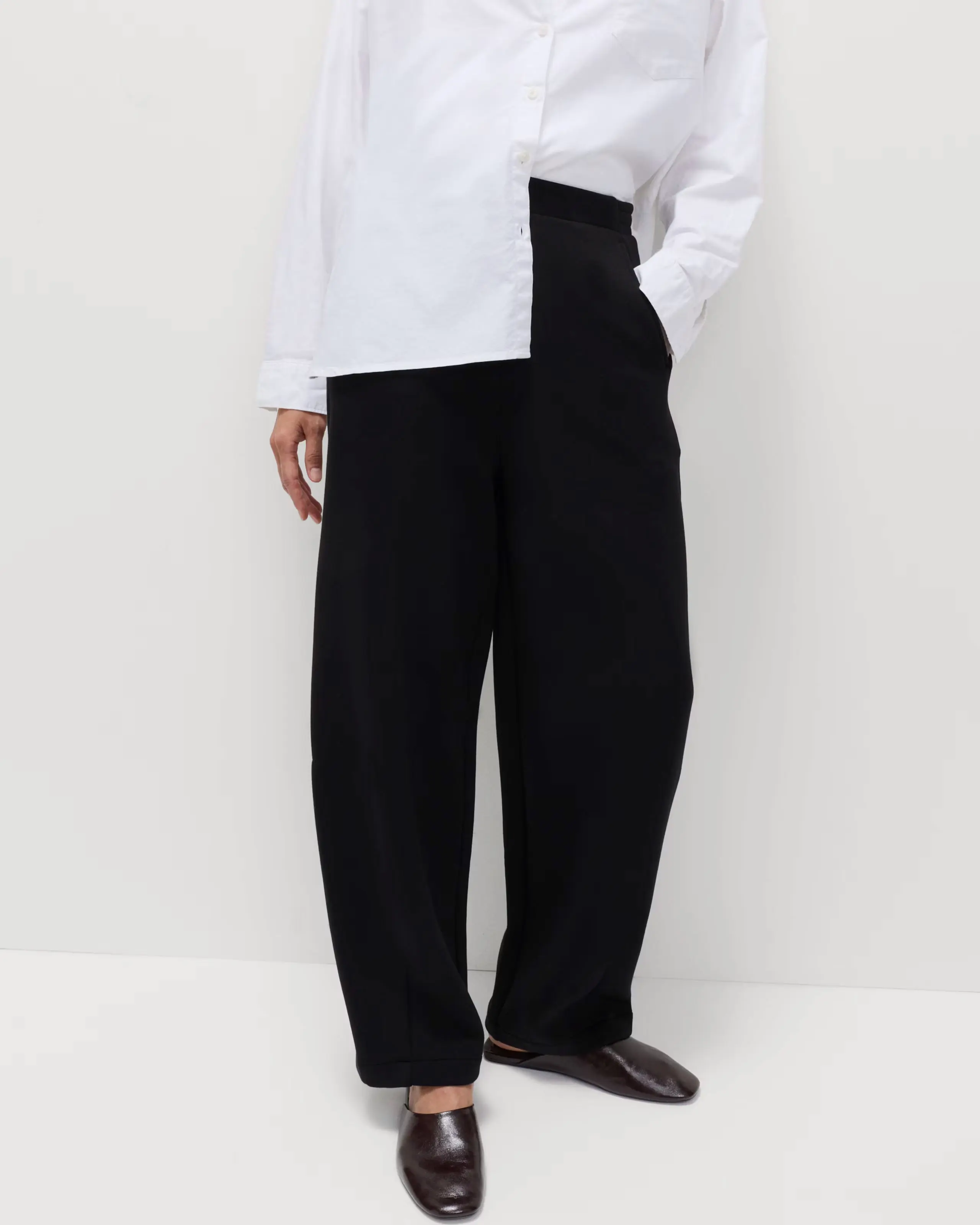 Woman wearing barrel-leg trousers