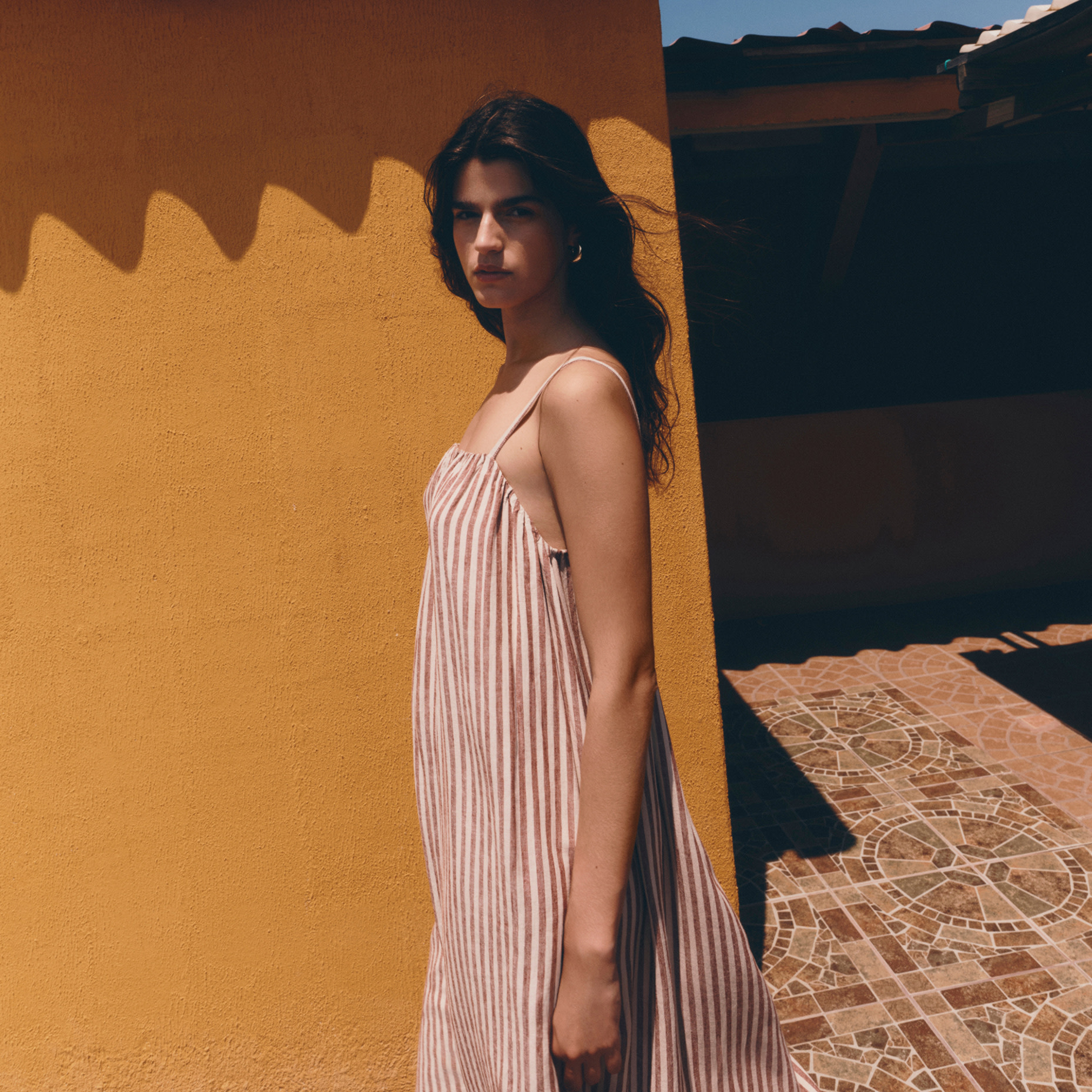 Woman wearing striped dress