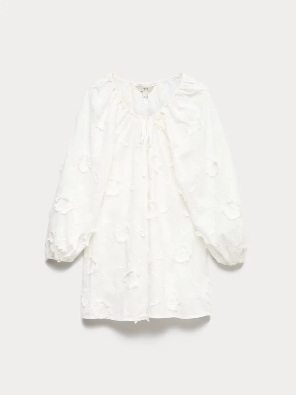 A white textured mini dress for summer