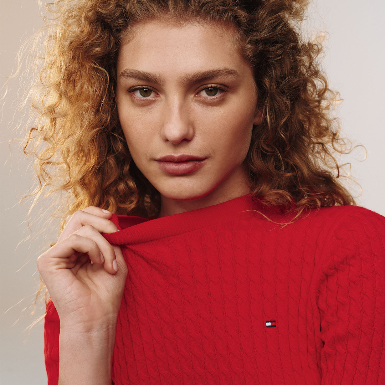 WOMAN WEARING RED JUMPER 