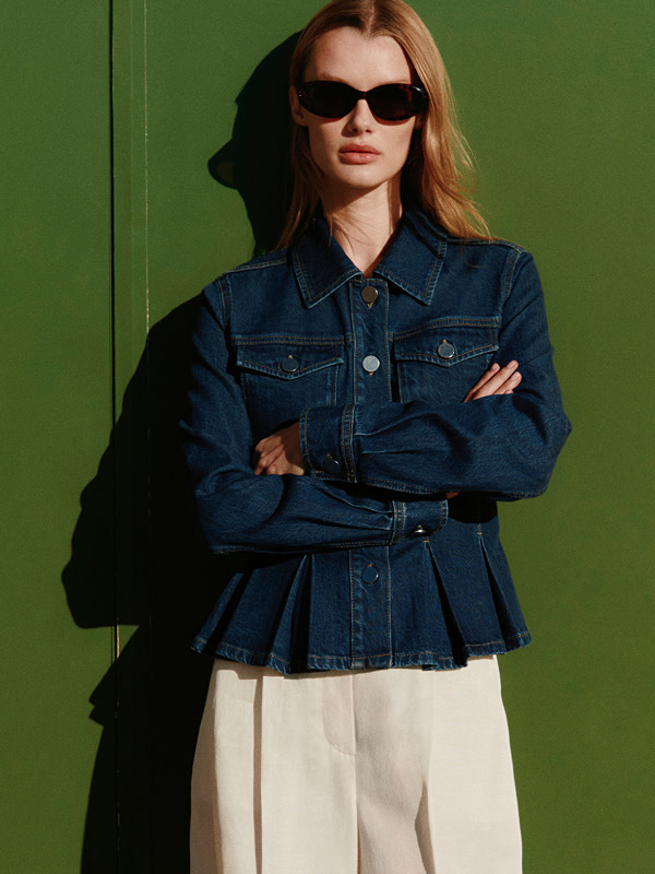 Woman in denim jacket