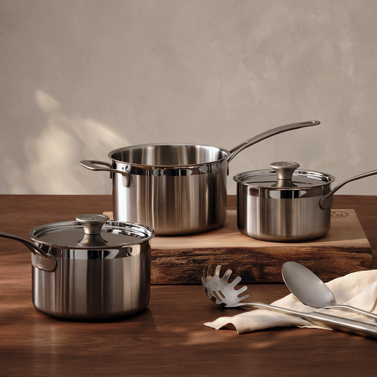 Pots and pans on wooden counter