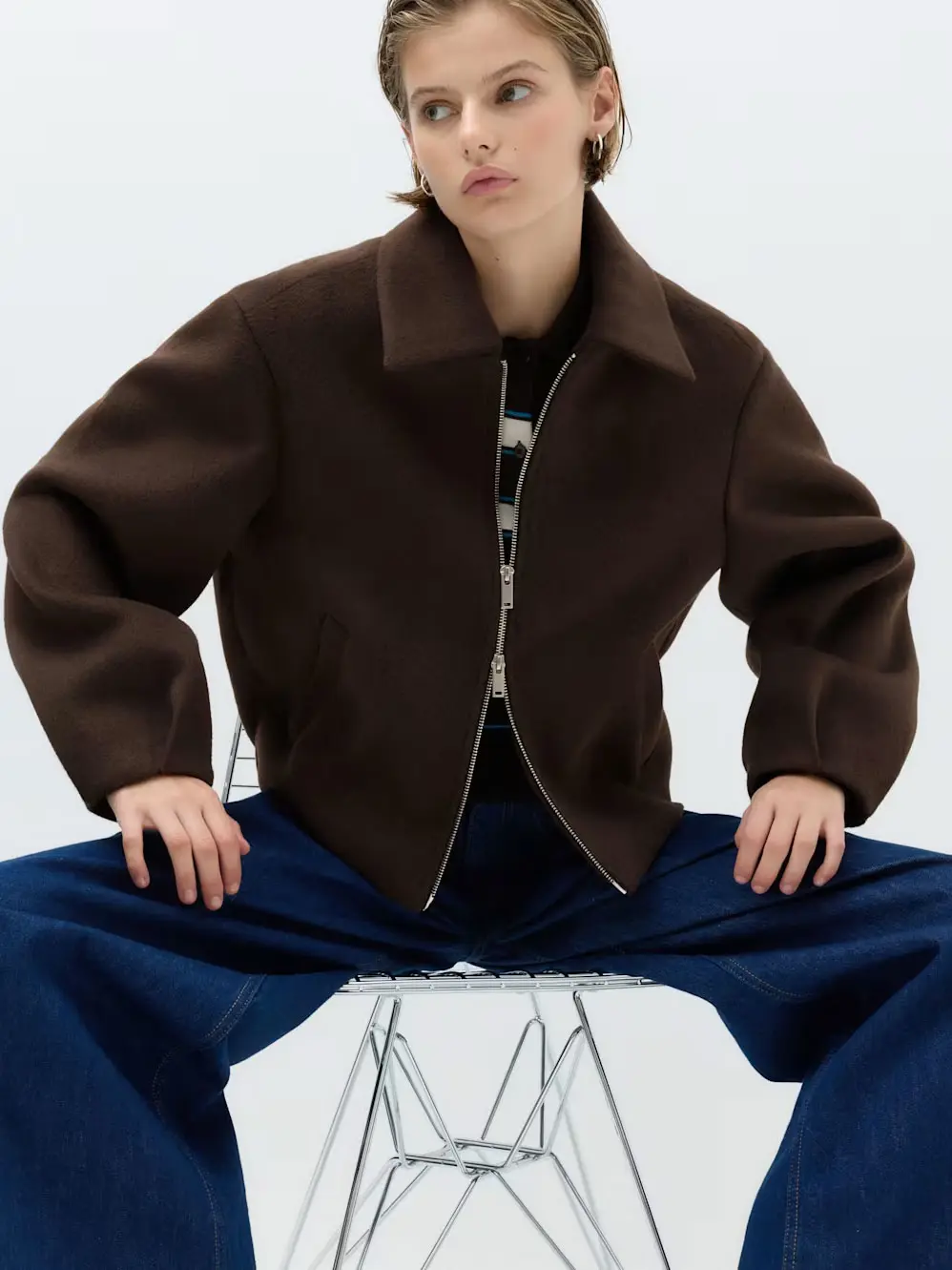 Woman in brown jacket