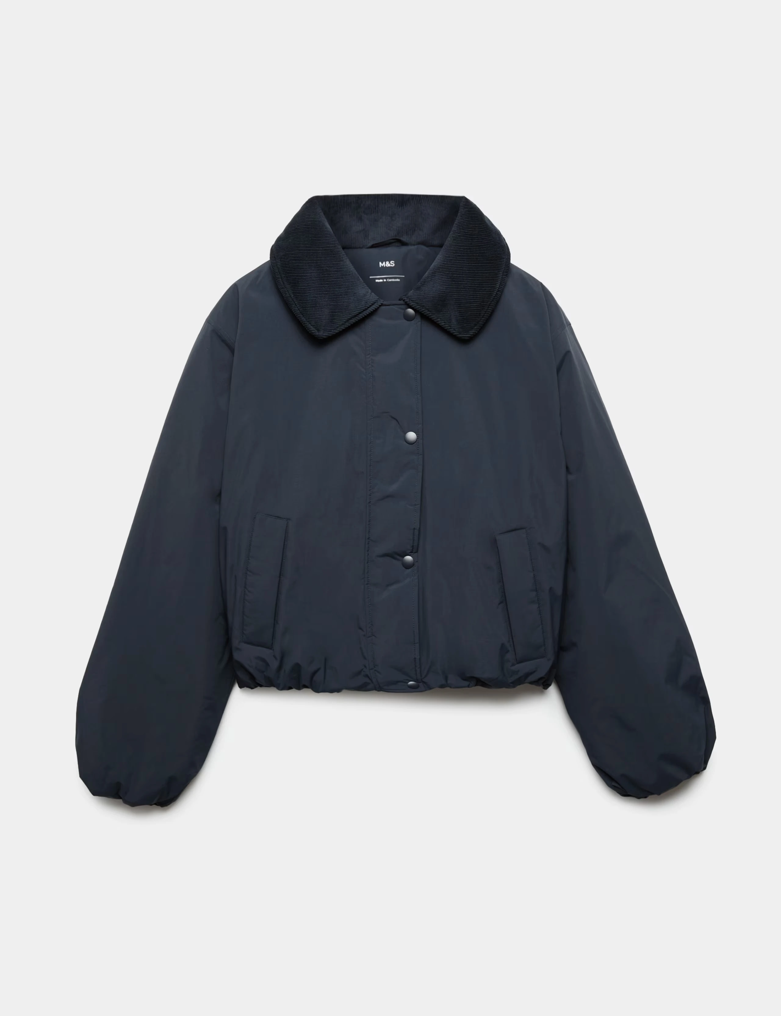 Blue padded puffy bomber jacket with a corduroy collar.