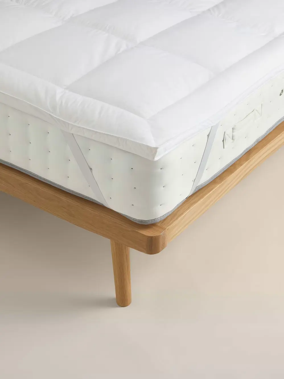 Mattress topper on bed