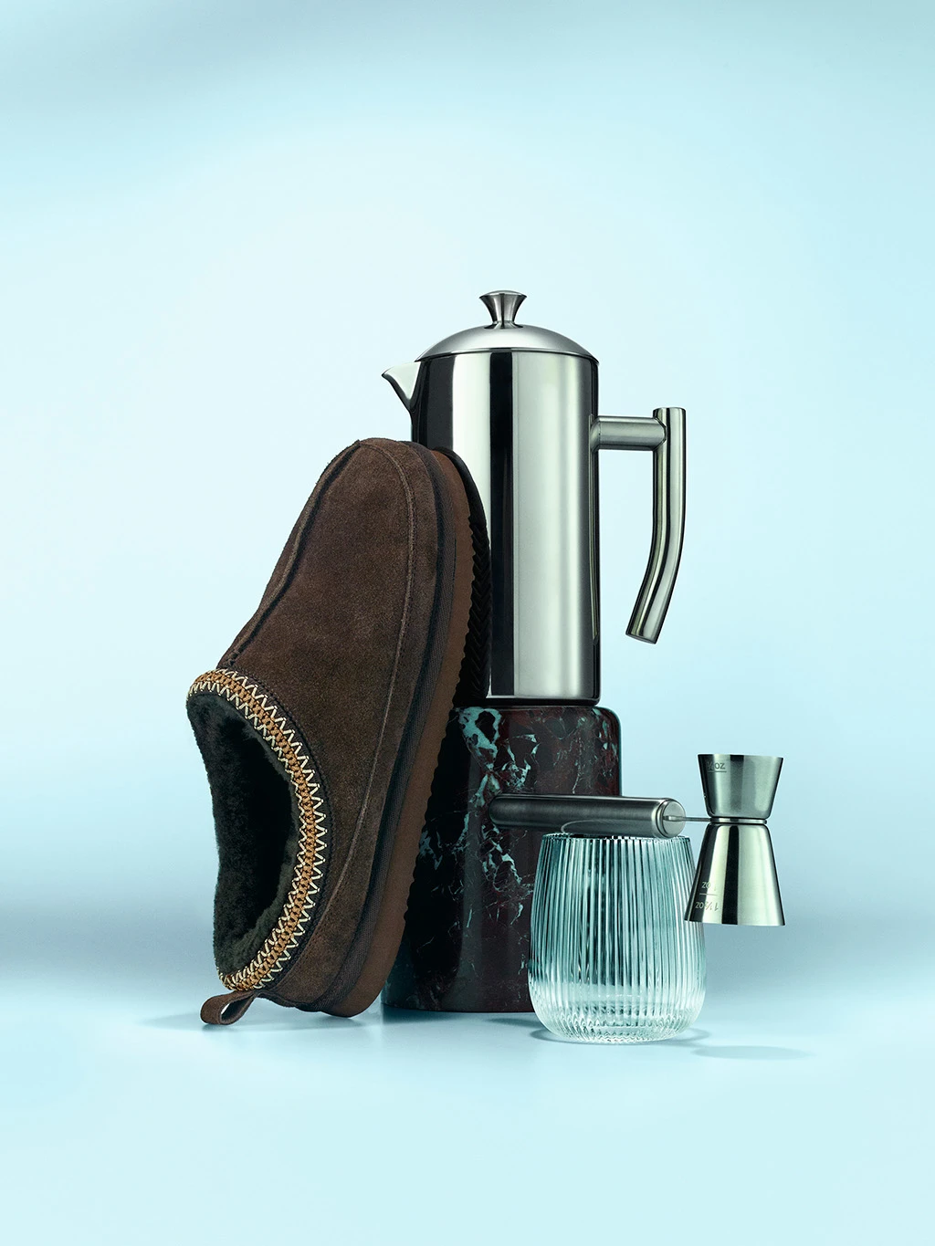 Group of presents including men's slippers, stainless steel cafetiere and glass cup.