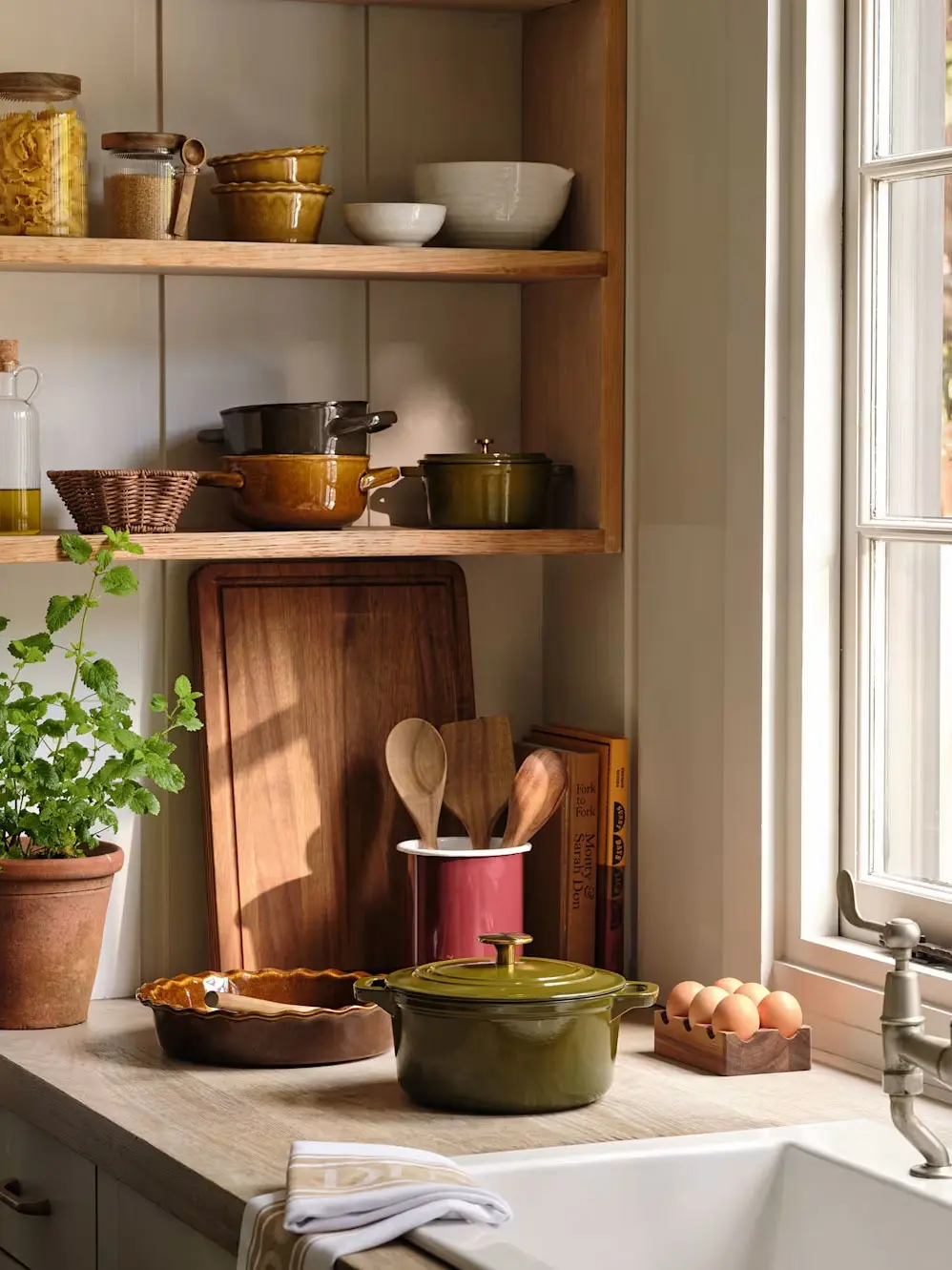 Kitchen with organised open shelves and countertops
