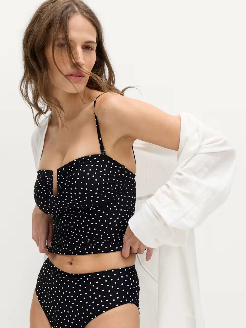 Woman in black tankini