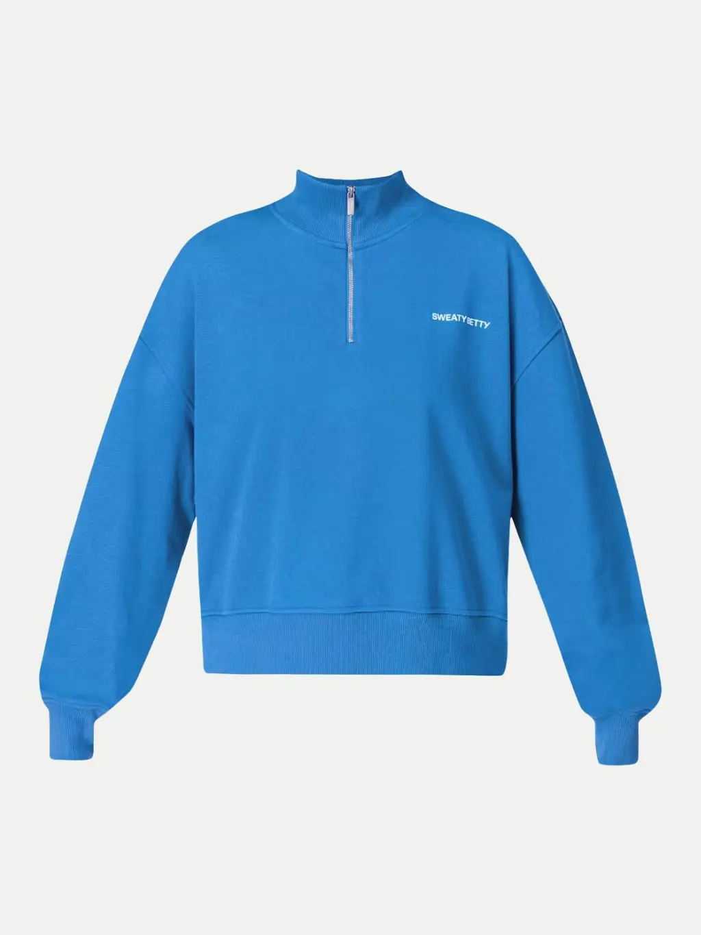 A cutout of a half zip up blue sweatshirt by Sweaty Betty