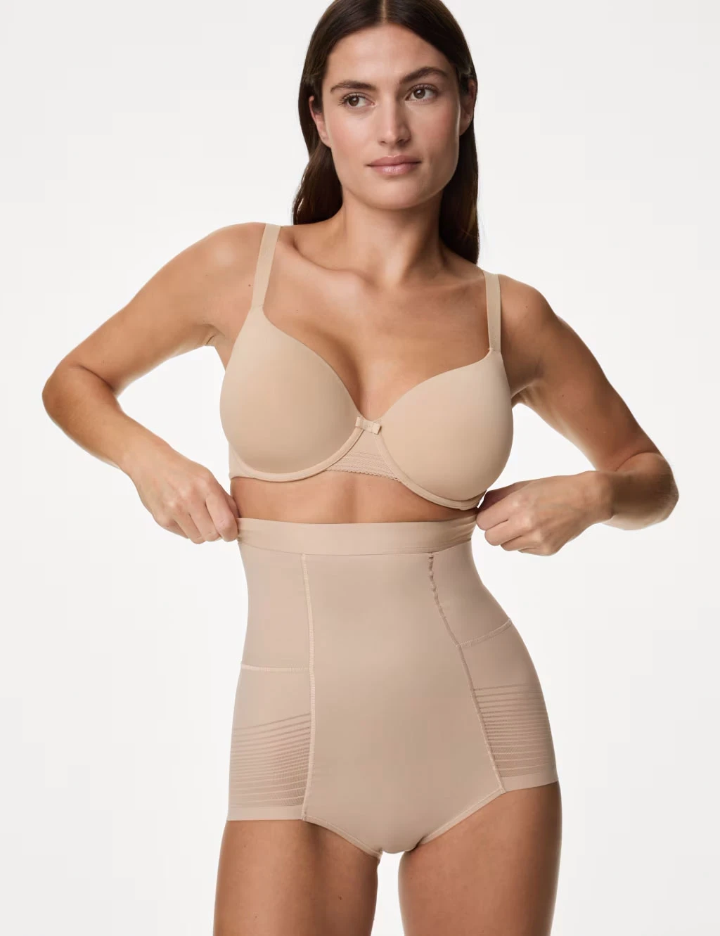 Women wearing beige shapewear. Shop shapewear