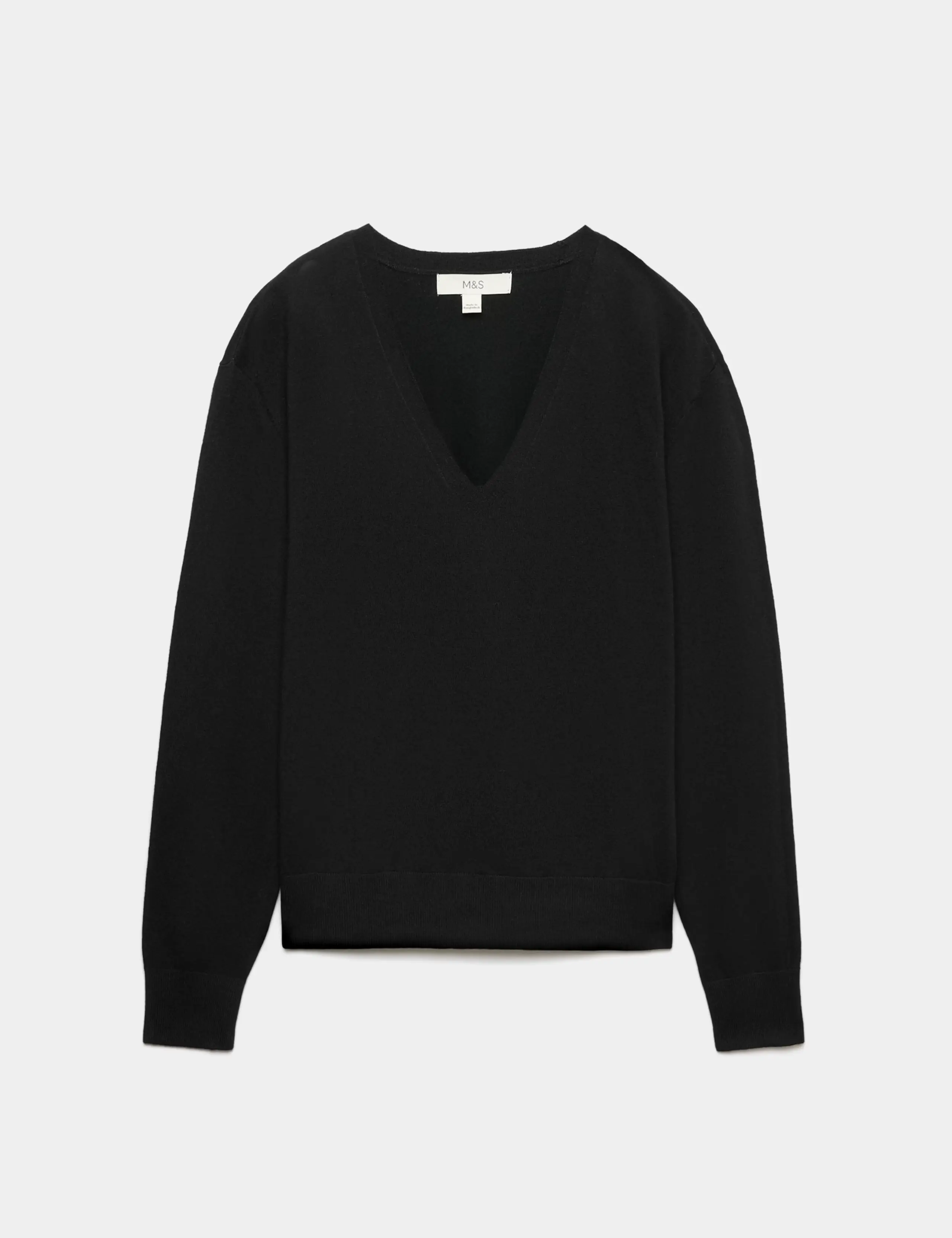 Black V-neck jumper.