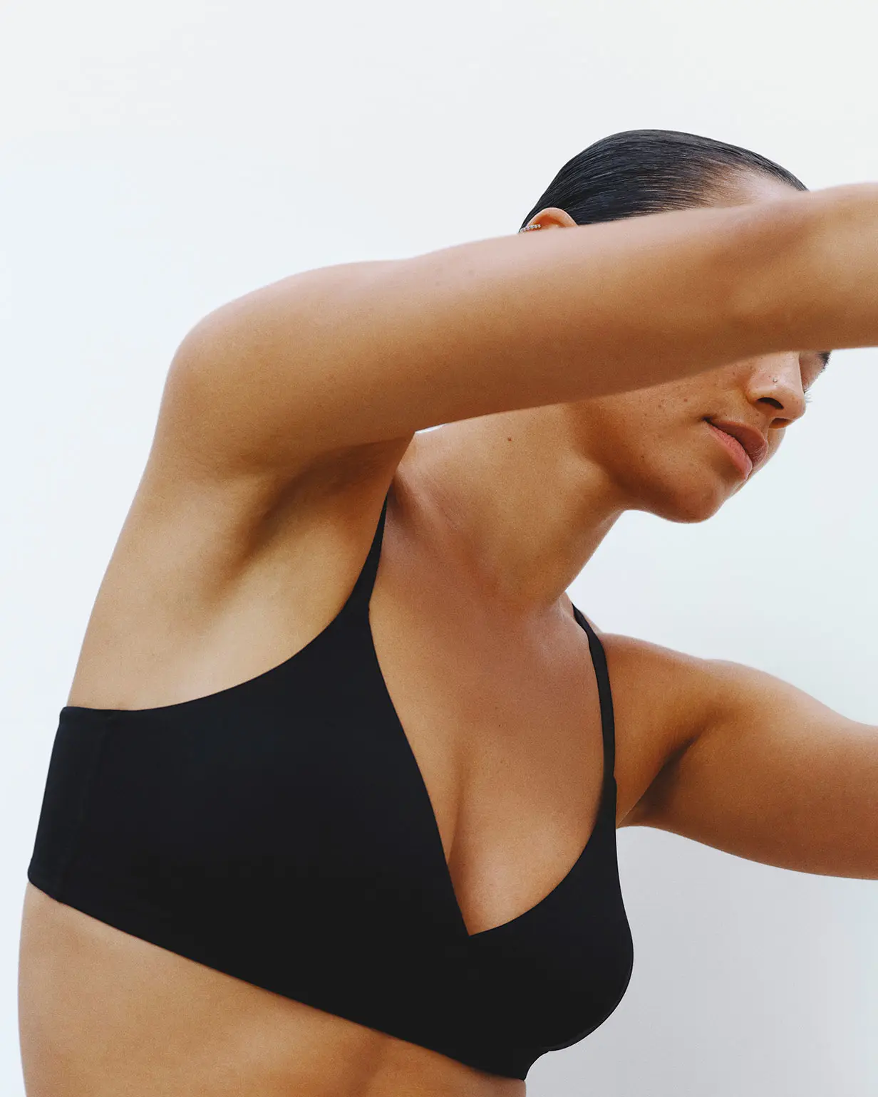 Woman wearing black non-wired M&S bra