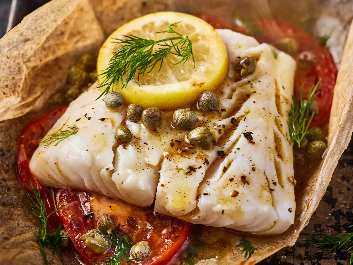 A white fish on greaseproof paper