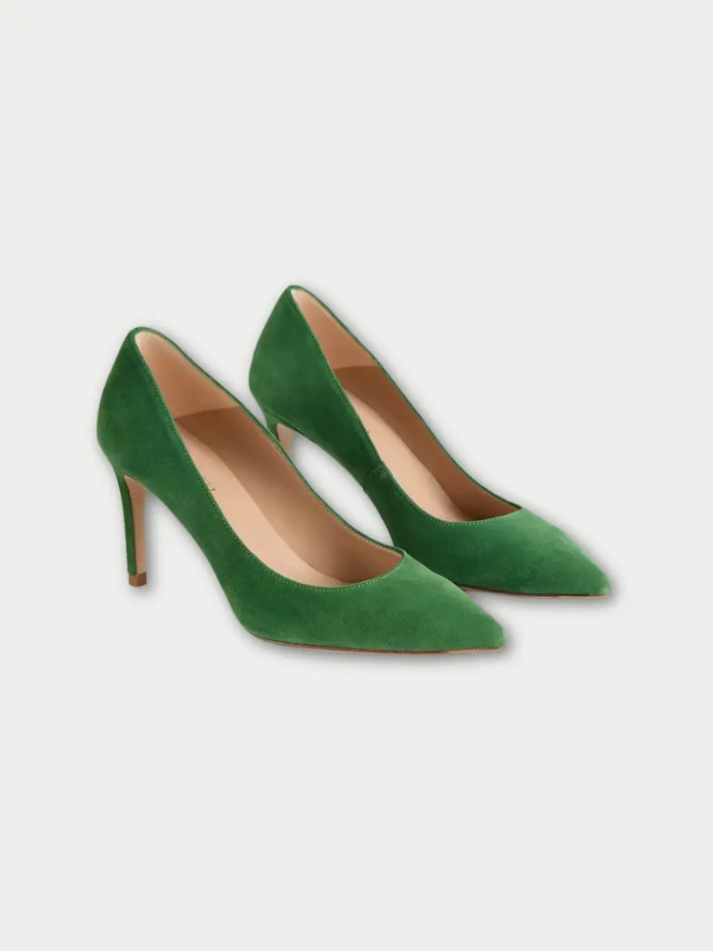 A cutout of green suede stiletto heels