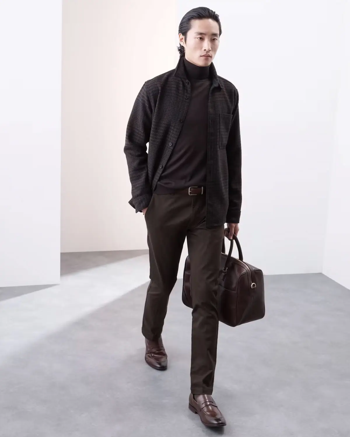 Man wearing slim-fit chinos at M&S