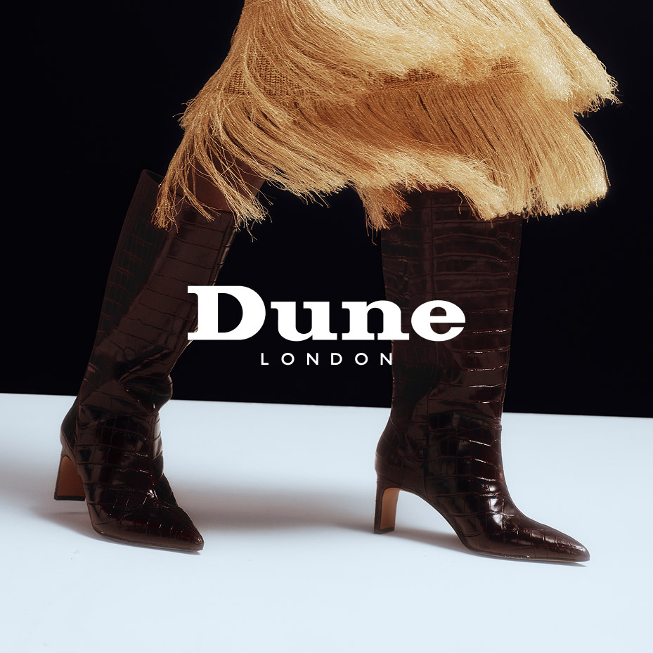 Woman wearing a pair of Dune boots