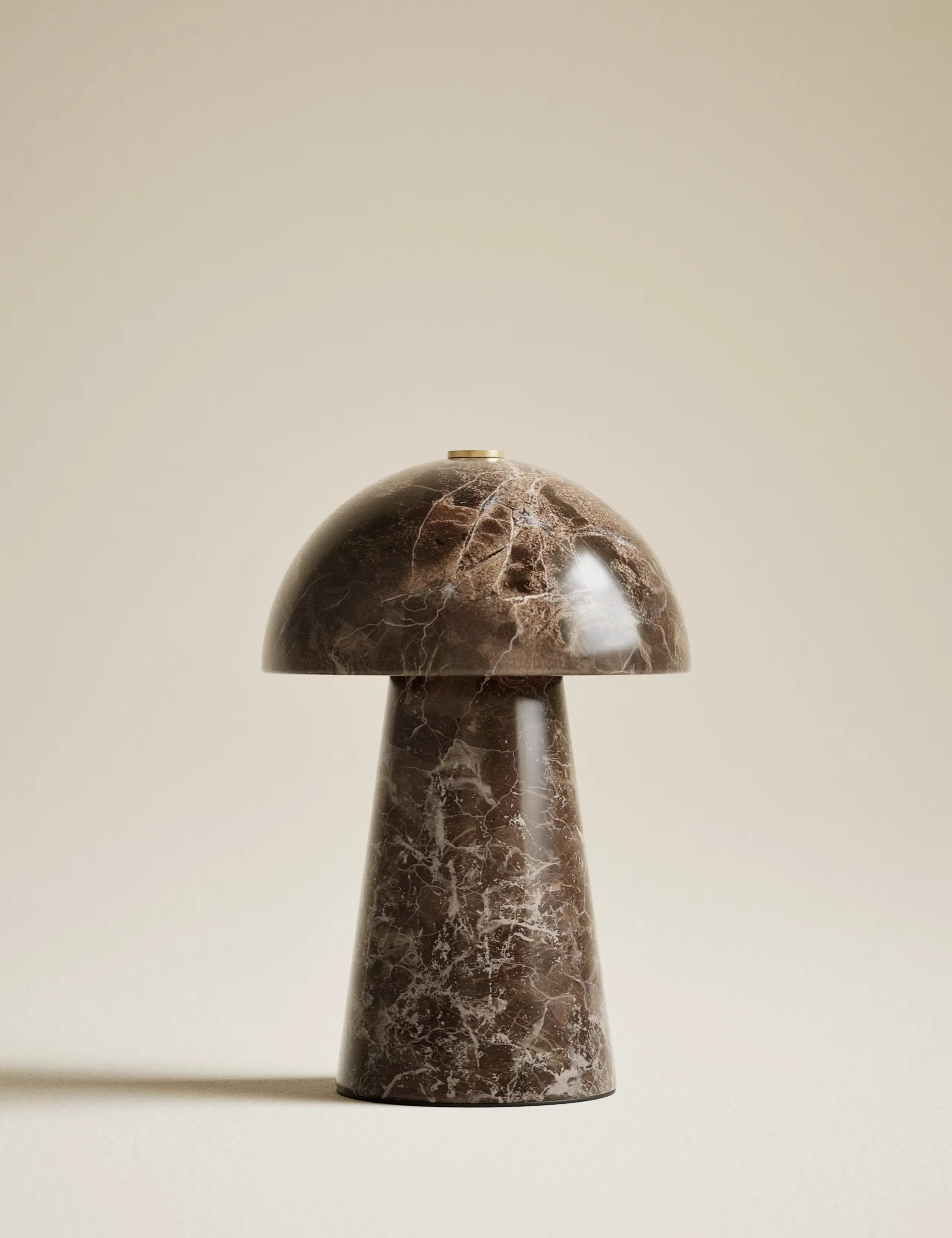 Small mushroom table lamp made from brown marble.