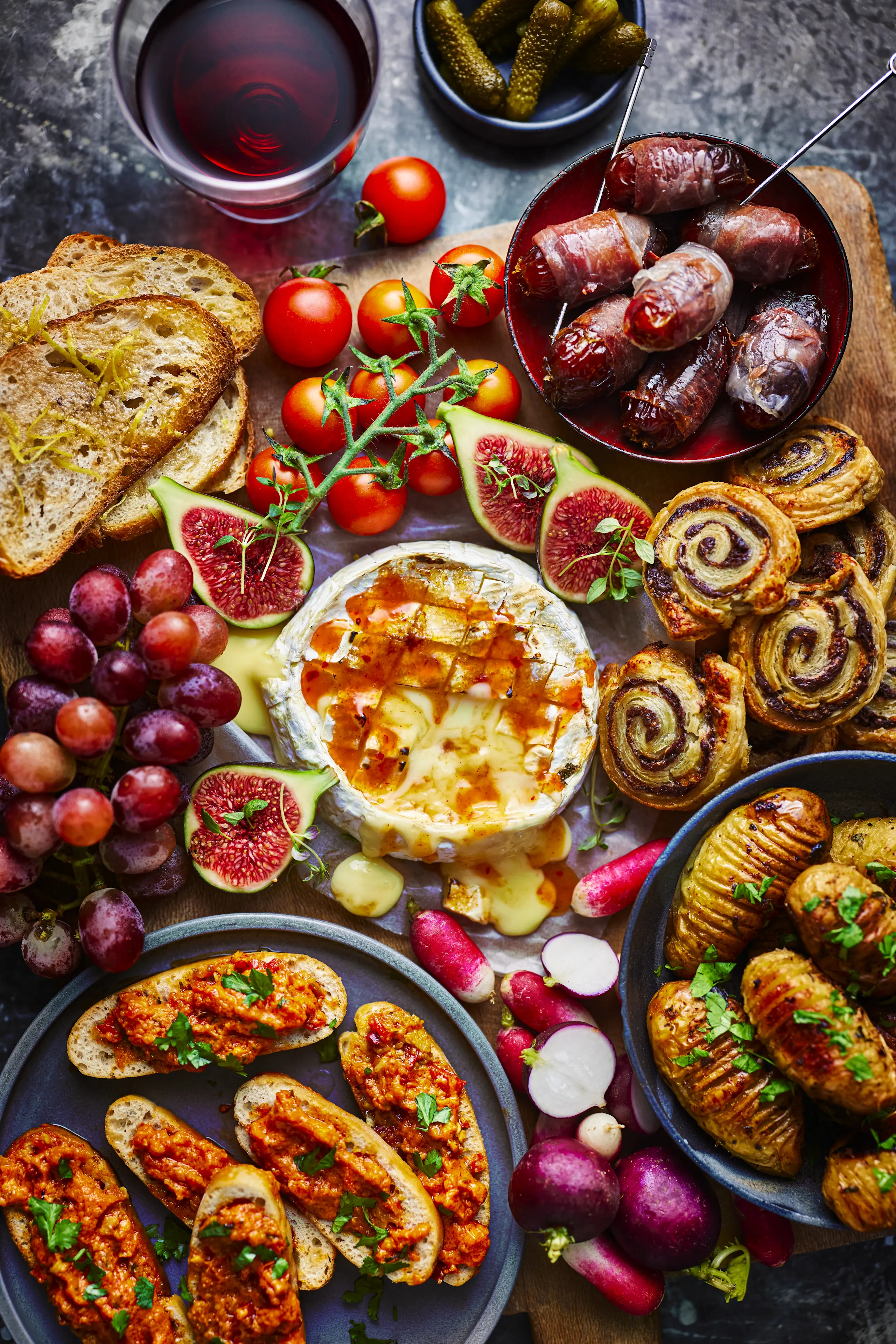 Savoury grazing board with plates of food and veggies
