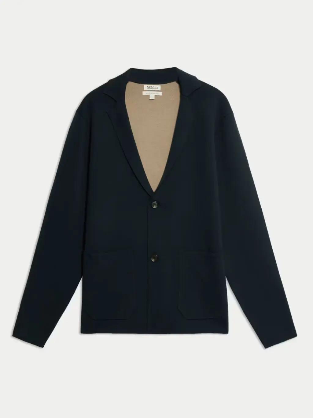 A cut out of a navy Merino wool jacket against a pale background