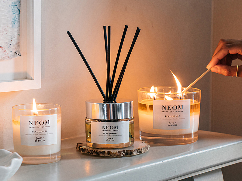 Assorted Neom scented candles and room diffusers. Read the buying guide