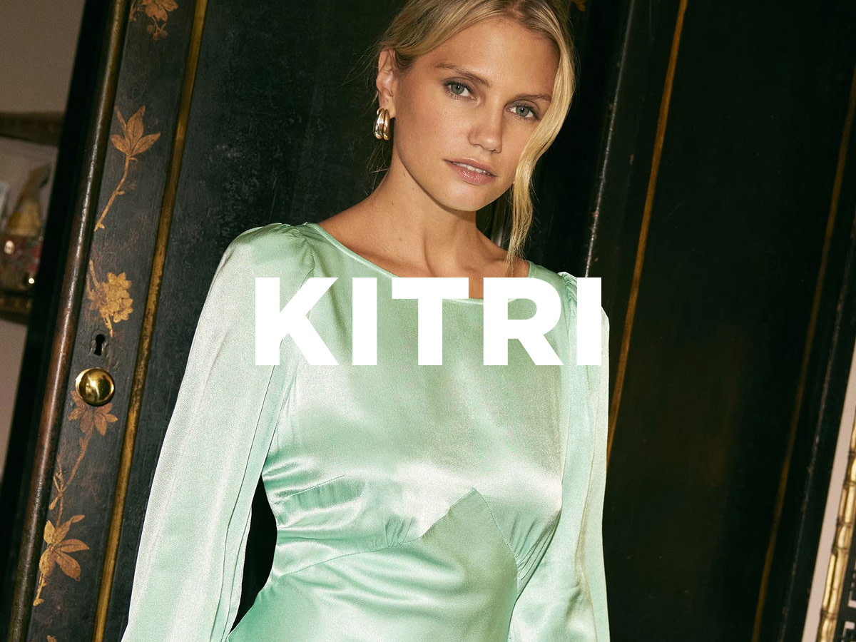 Woman wearing sea green satin dress