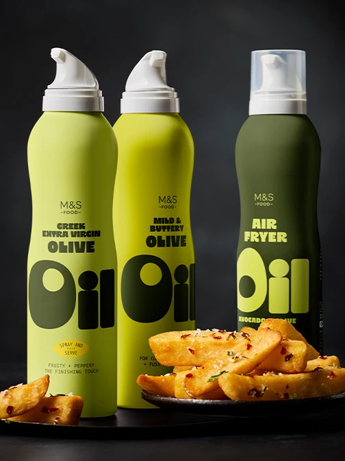 Prawns, salad, poppadoms, and mango chutney on blue plate