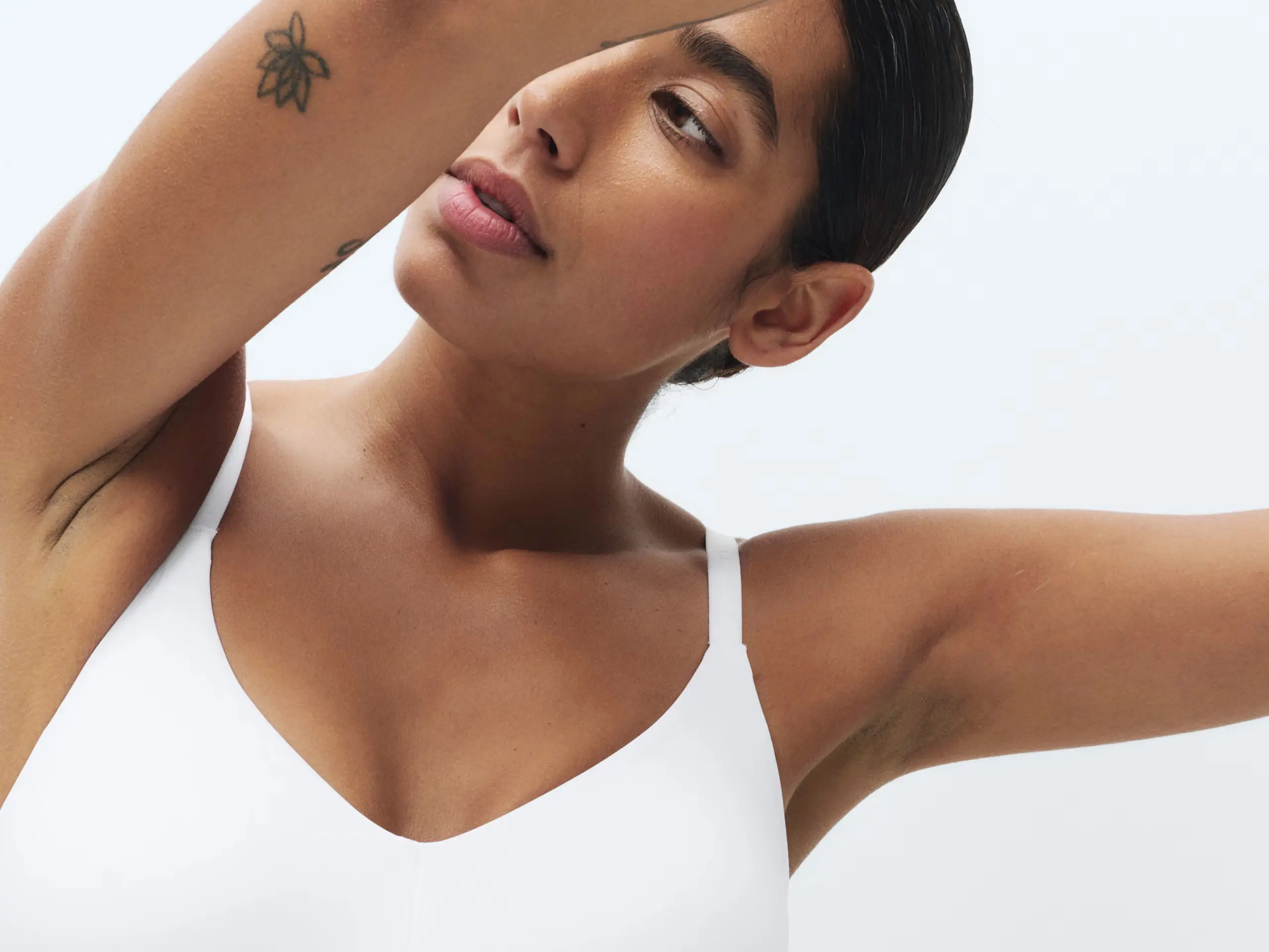 Woman wearing white bra