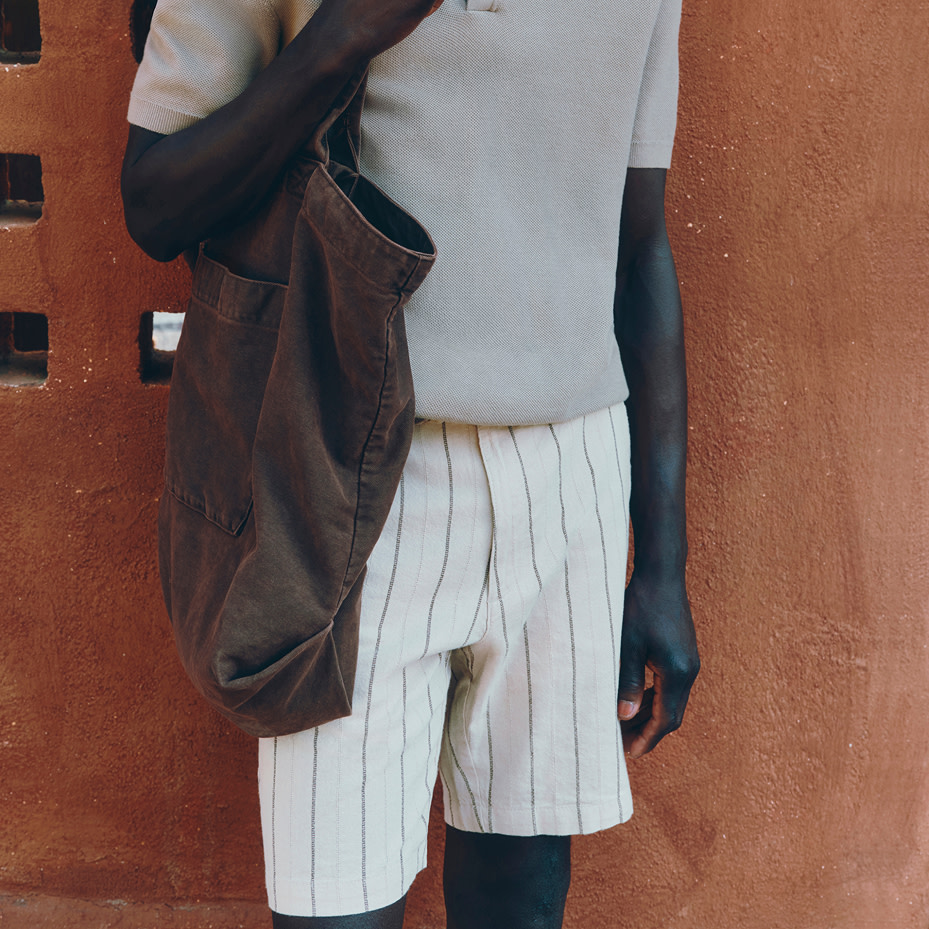 Man wearing striped shorts