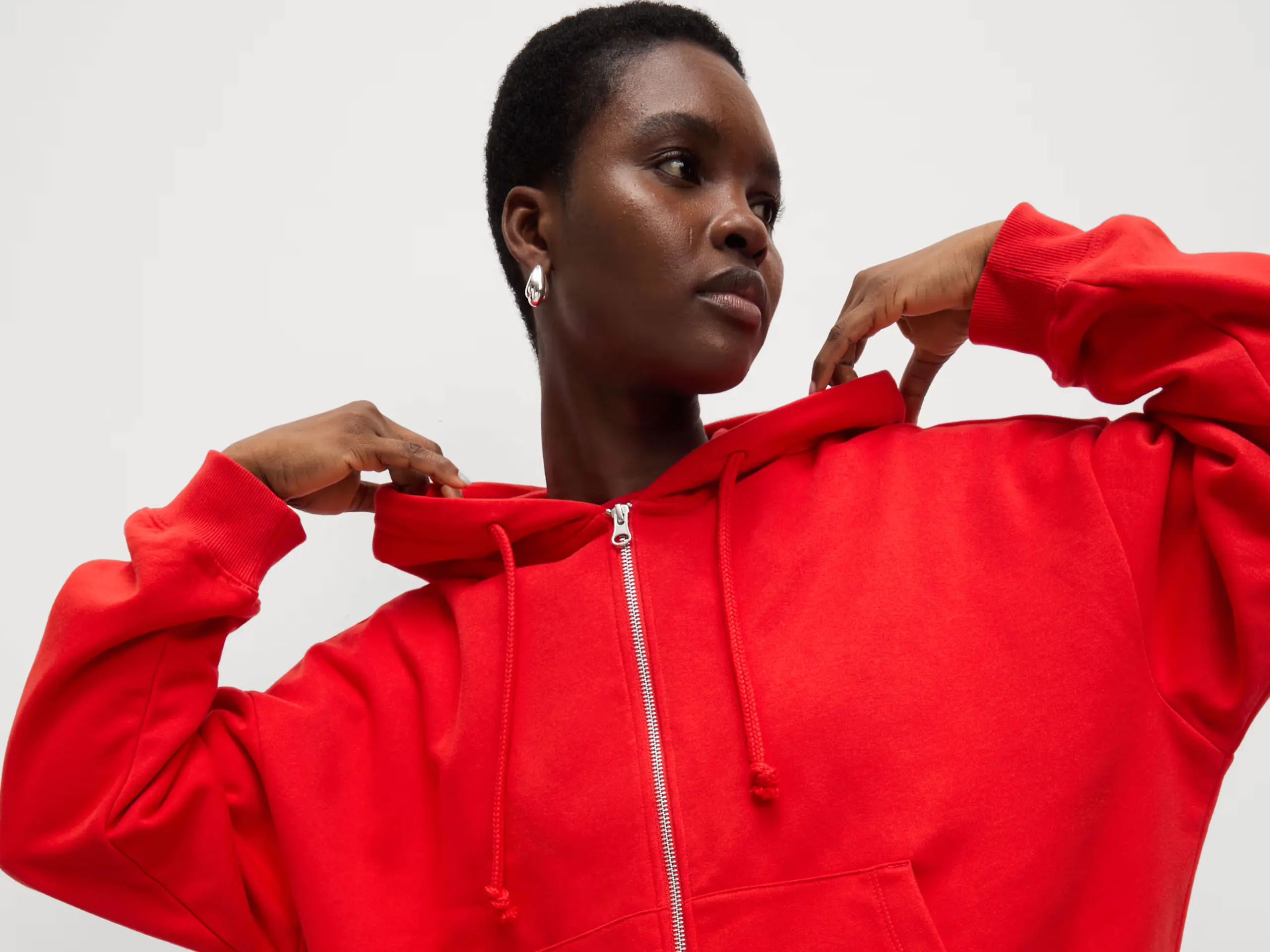Woman wearing red hoodie