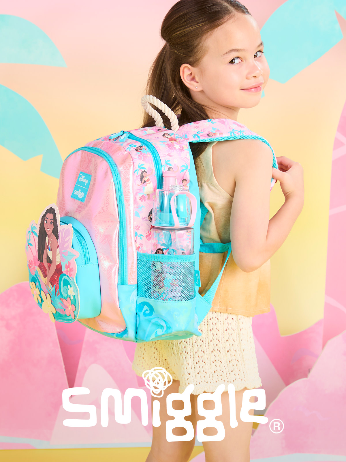 Child wearing a printed Smiggle backpack