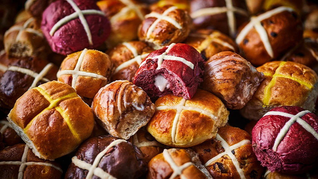 A pile of hot cross buns
