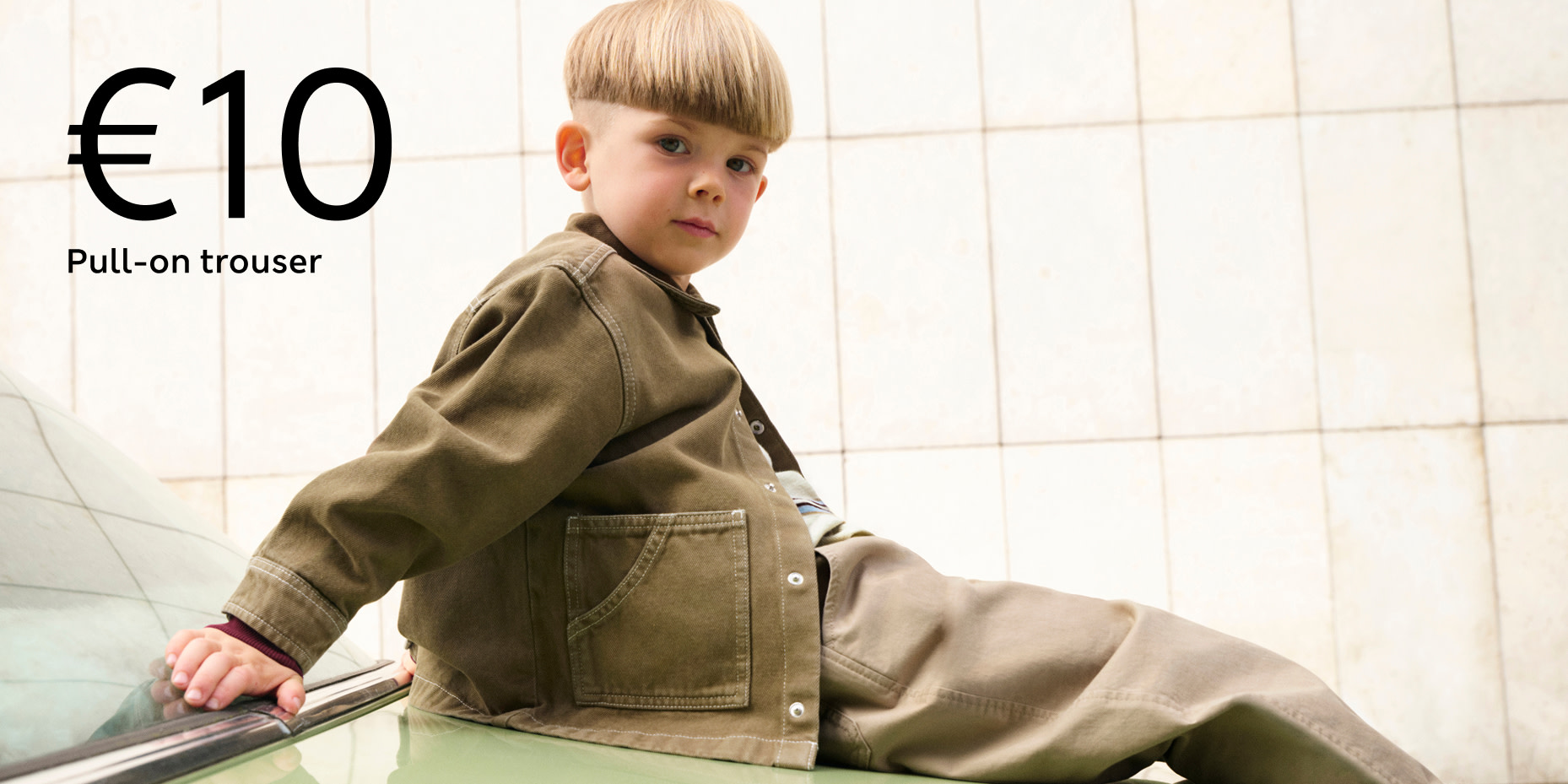Boy with green jacket