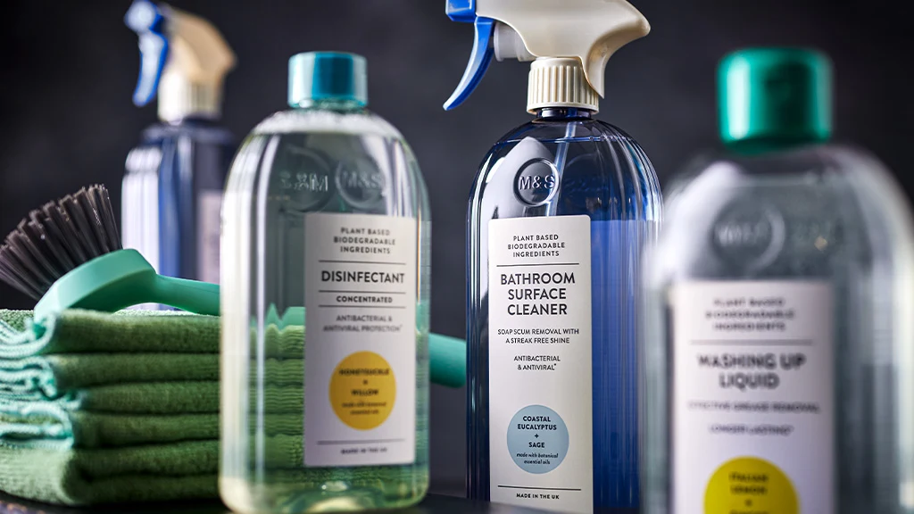 Cleaning products on black background