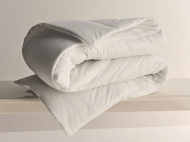 Duvet folded on shelf