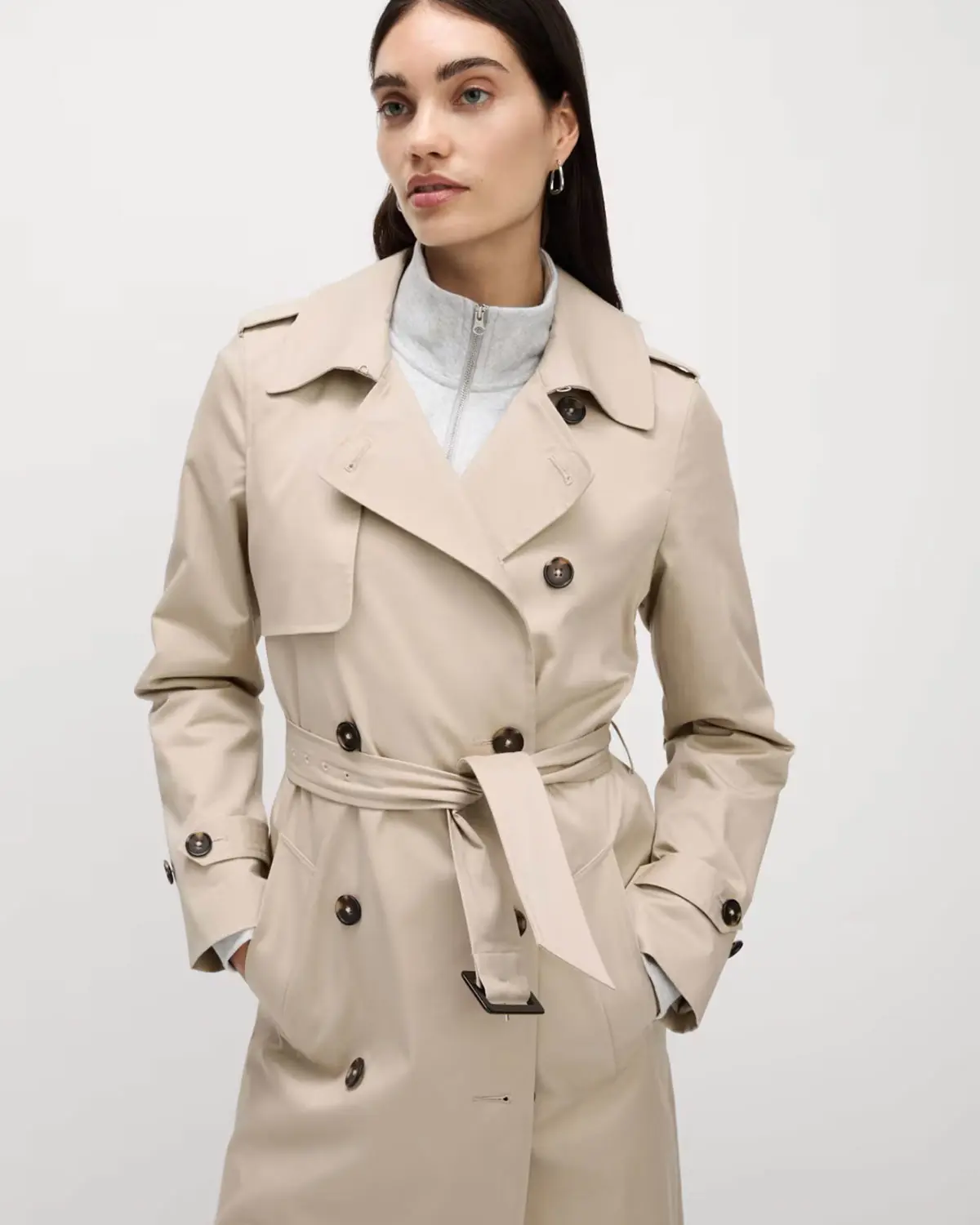Woman wearing a trench coat at M&S