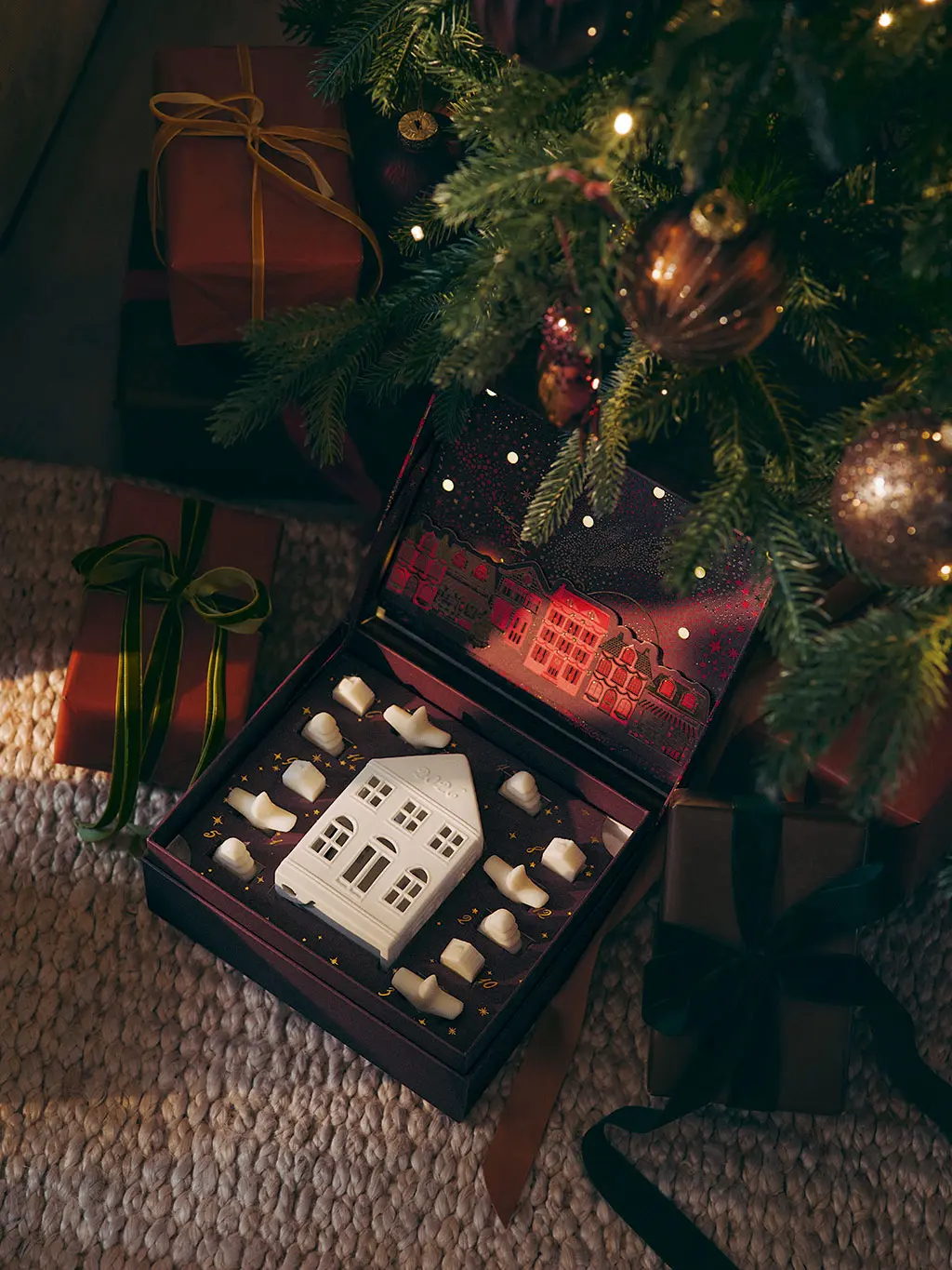 Candle advent calendar under tree