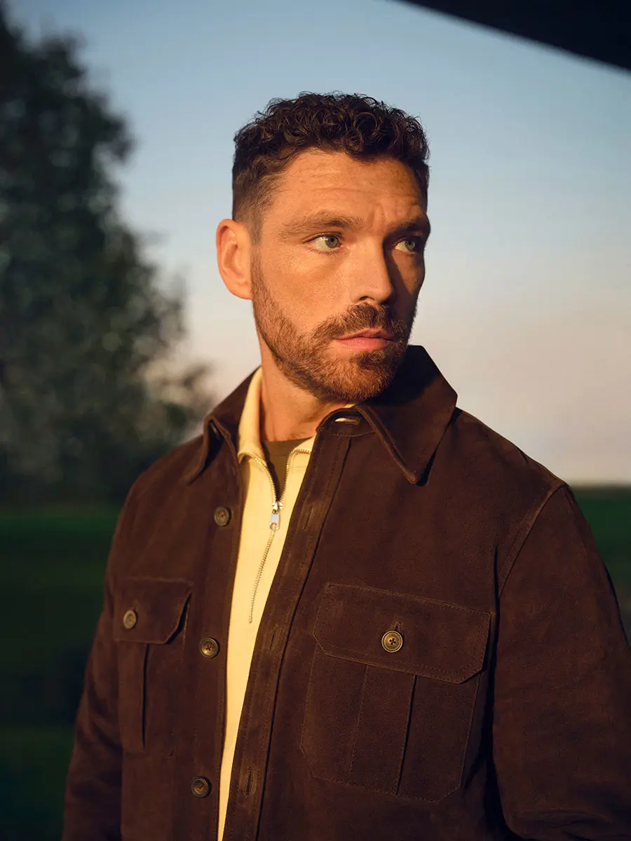 James Nelson Joyce in brown overshirt