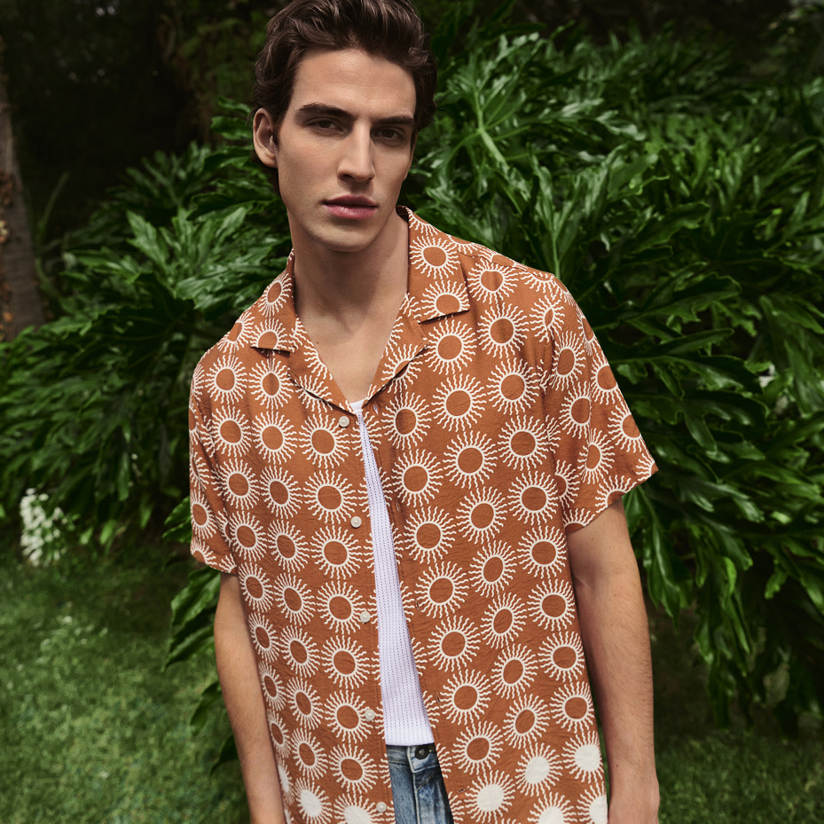 Man wearing printed shirt