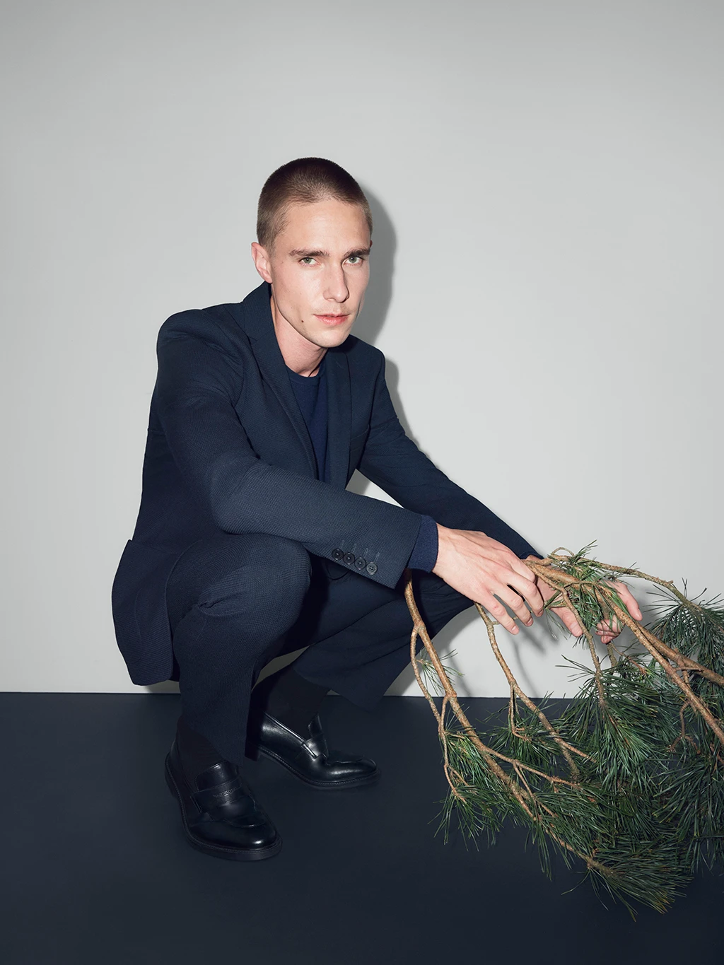Man wearing navy suit
