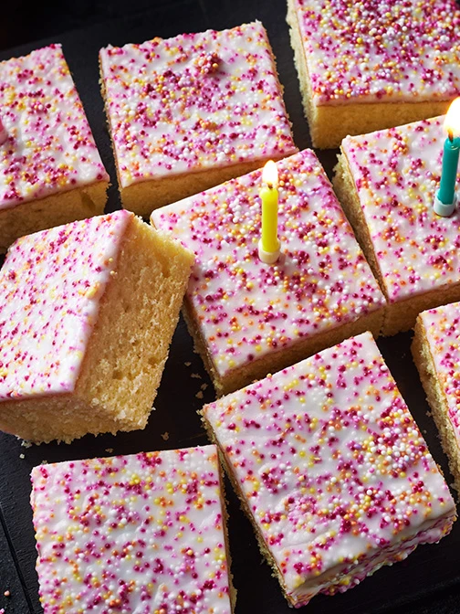 Sprinkle traybake cake cut into squares